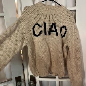 Chic Cream Sweater with Black Text